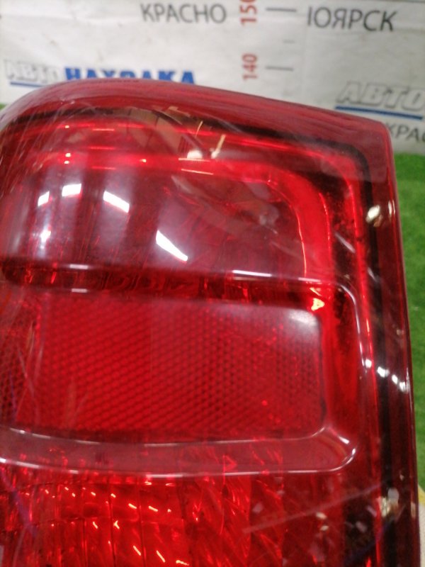 Фонарь задний задний левый NAVIGATOR 2002-2006 U228 Triton 3V
