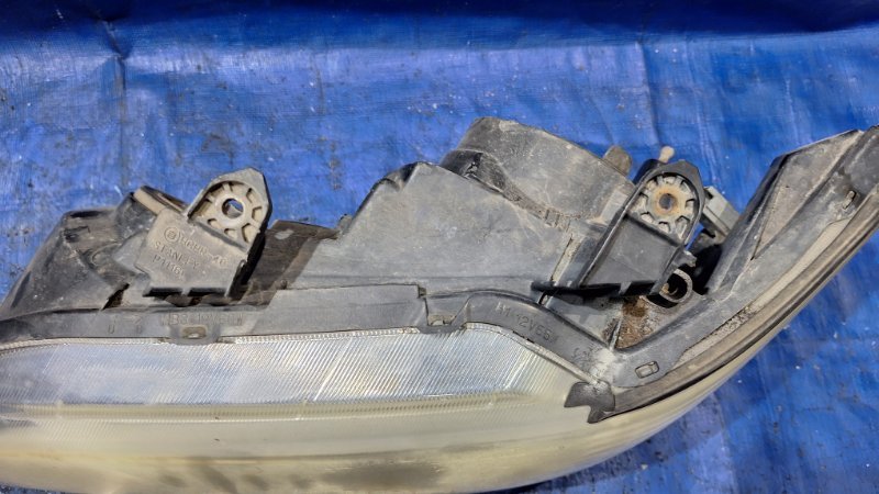 Фара галогеновая передняя левая MITSUBISHI Lancer Cedia 9 4G15
