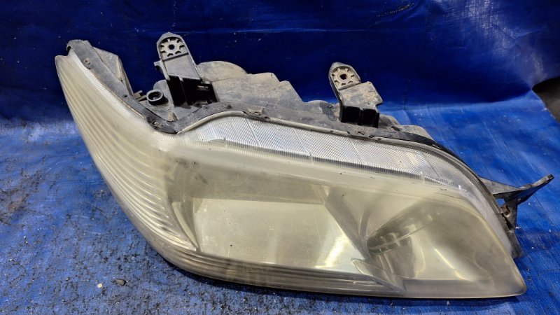 Фара галогеновая передняя правая Lancer Cedia 2001 9 4G15
