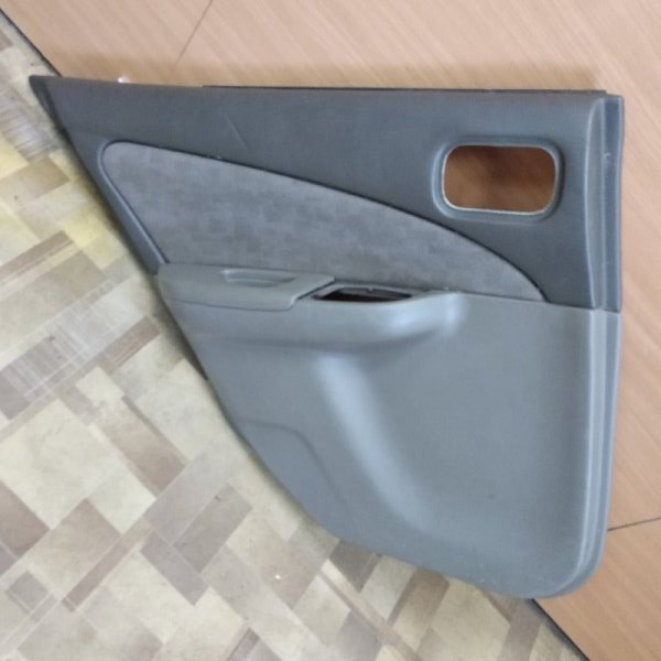 Обшивка двери Nissan Sunny FB15 задняя левая