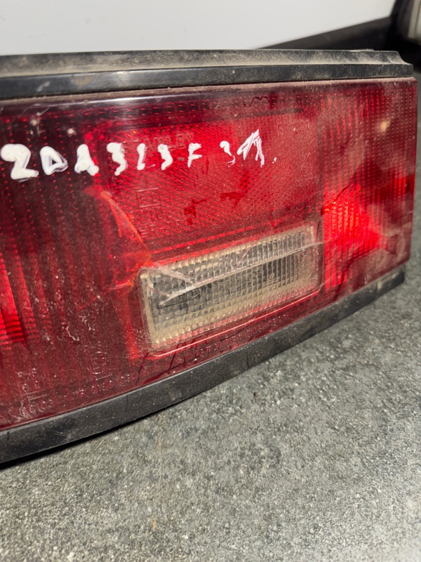 Фонарь задний задний левый Mazda 323F BG