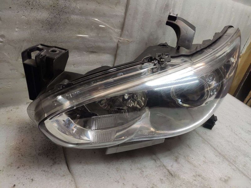 Фара левая JX25 L50