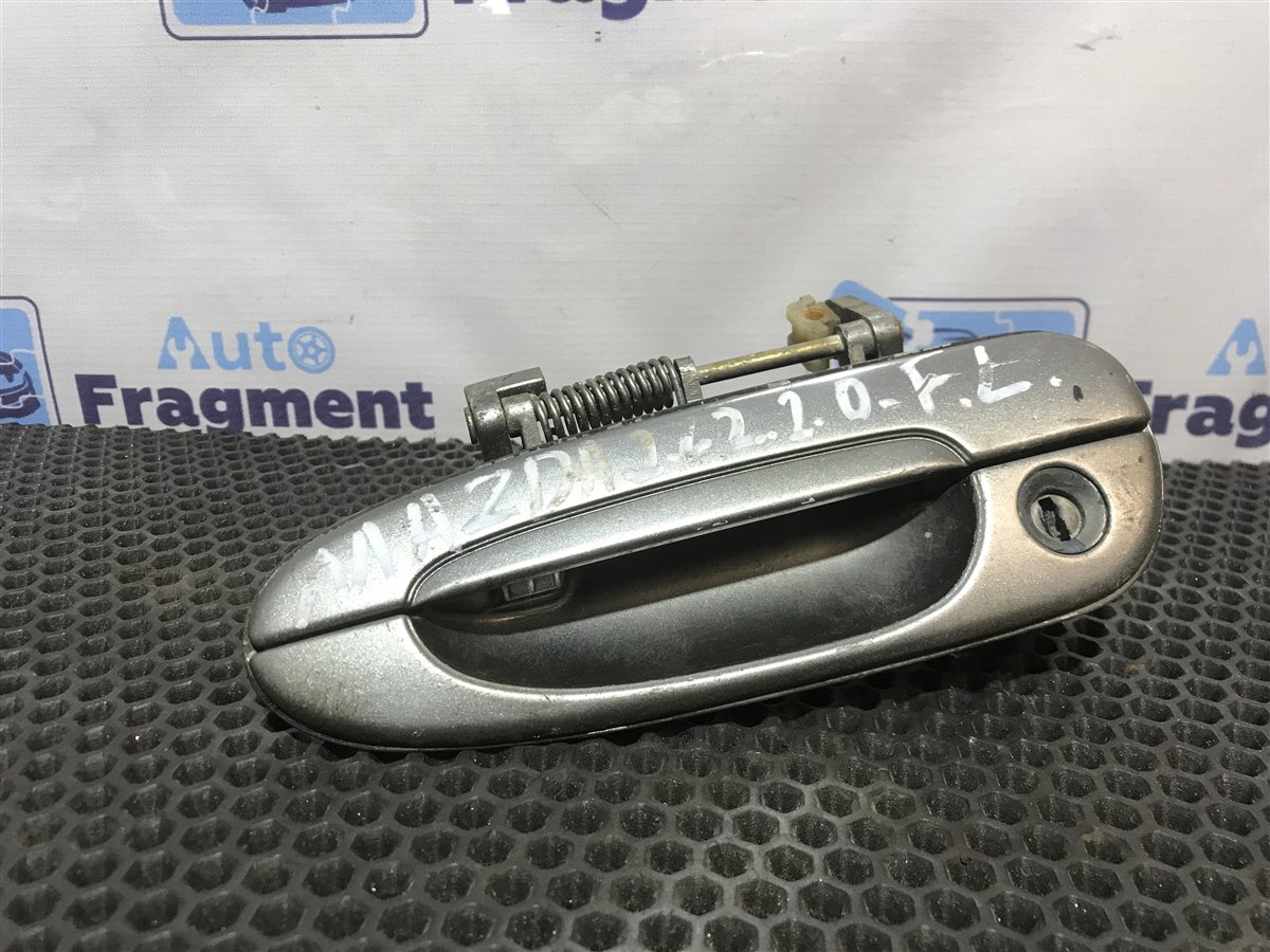 Ручка двери нaружная передняя левая Mazda 626 1992 FS 2.0 GE4T59410 Б/У