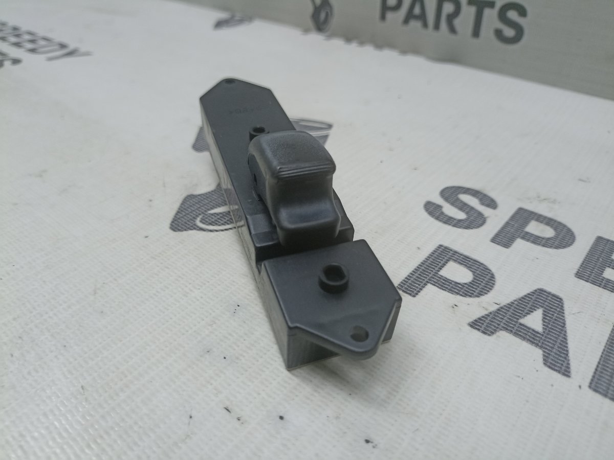 Кнопка стеклоподъемника передняя левая Lancer Cedia 2001 GH-CS5W 4G93 Кнопка стеклоподъемника передняя левая Lancer Cedia 2001 GH-CS5W 4G93