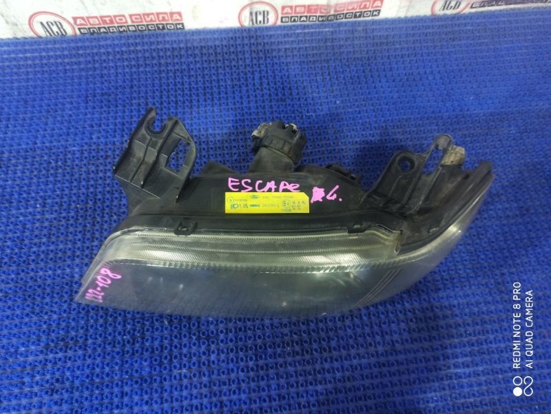 Фара левая ESCAPE LFACT