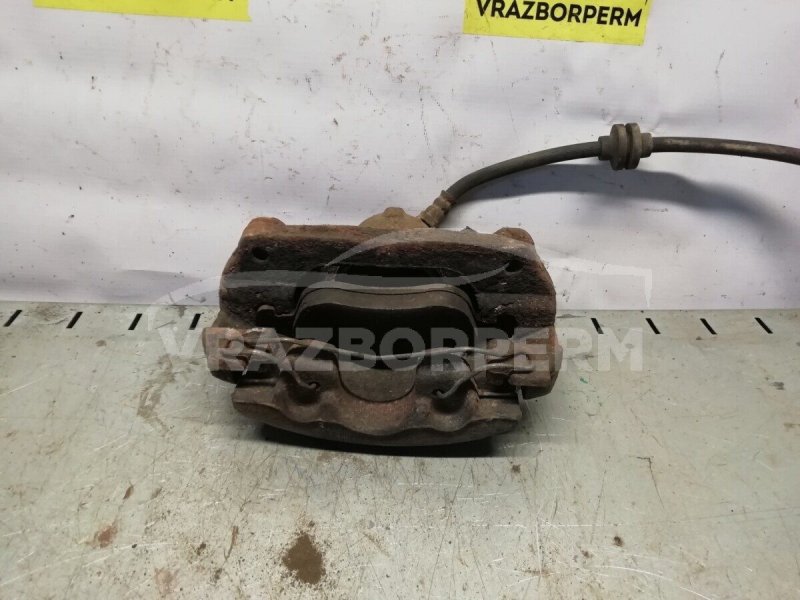 Суппорт тормозной передний правый Duster 2012