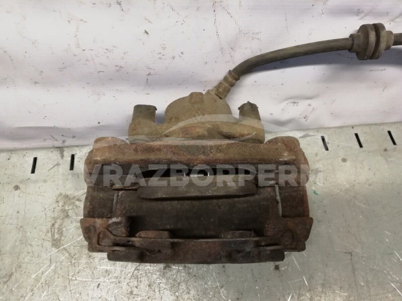 Суппорт тормозной передний правый Renault Duster