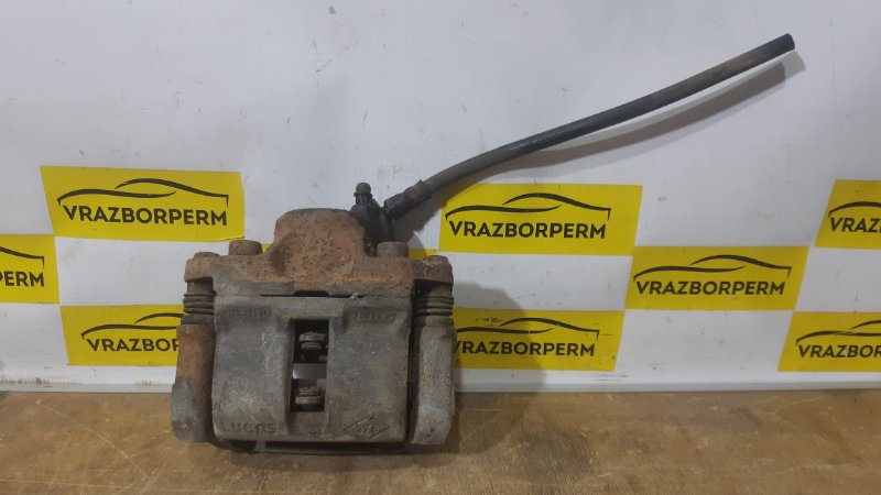 Суппорт тормозной передний левый Renault Logan 2011-2020 7701207958 Б/У
