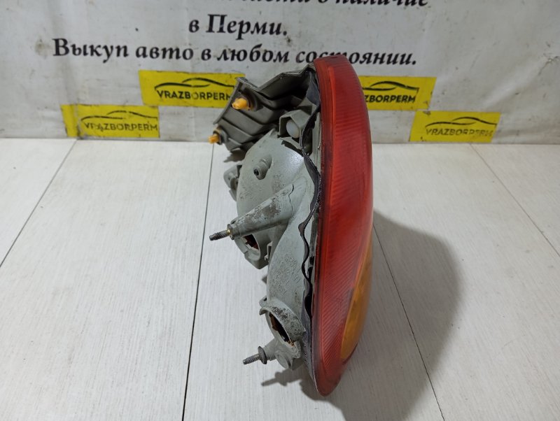 Фонарь (стоп сигнал) задний левый SPECTRA 2006 S5D