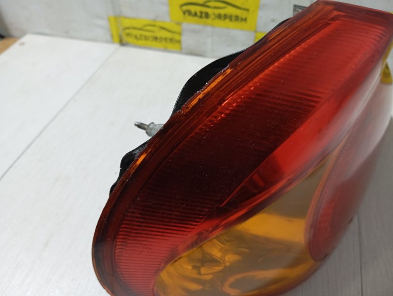 Фонарь (стоп сигнал) задний левый SPECTRA 2006 S5D