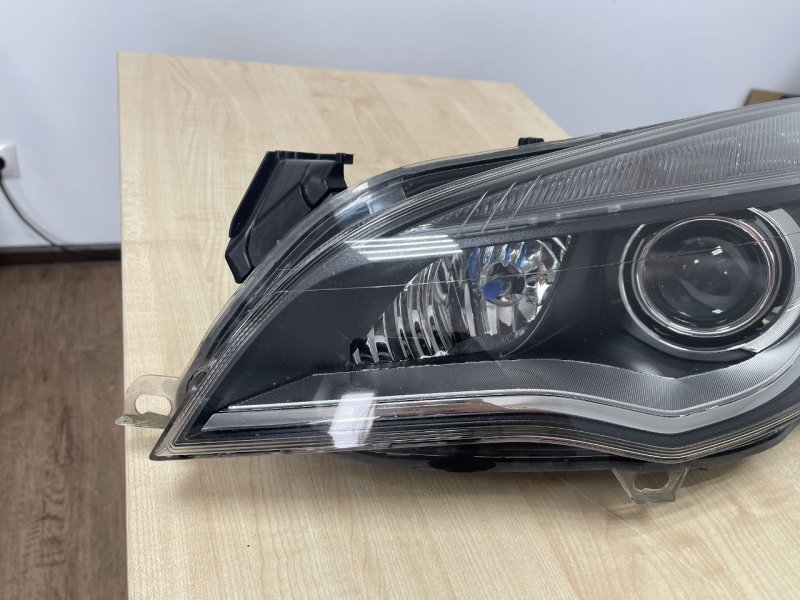 Фара передняя левая Astra J