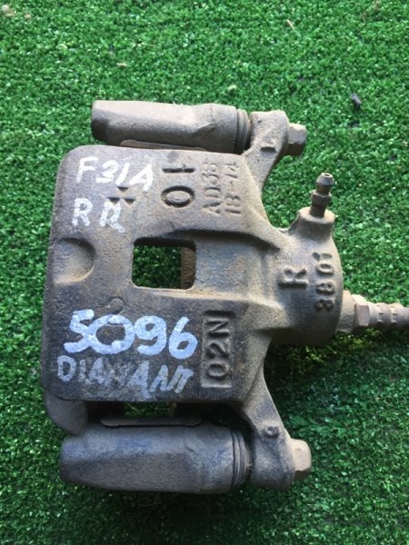 Запчасть суппорт задний правый MITSUBISHI DIAMANTE F31A 6G73 MB950352 контрактная Суппорт задний правый MITSUBISHI DIAMANTE F31A 6G73 MB950352 контрактная