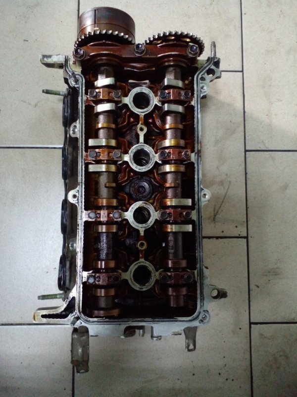 Головка блока цилиндров Toyota Funcargo NCP20 2NZ 1999 передняя