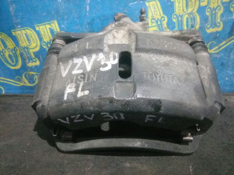 Суппорт Toyota Camry Prominent VZV30 передний левый