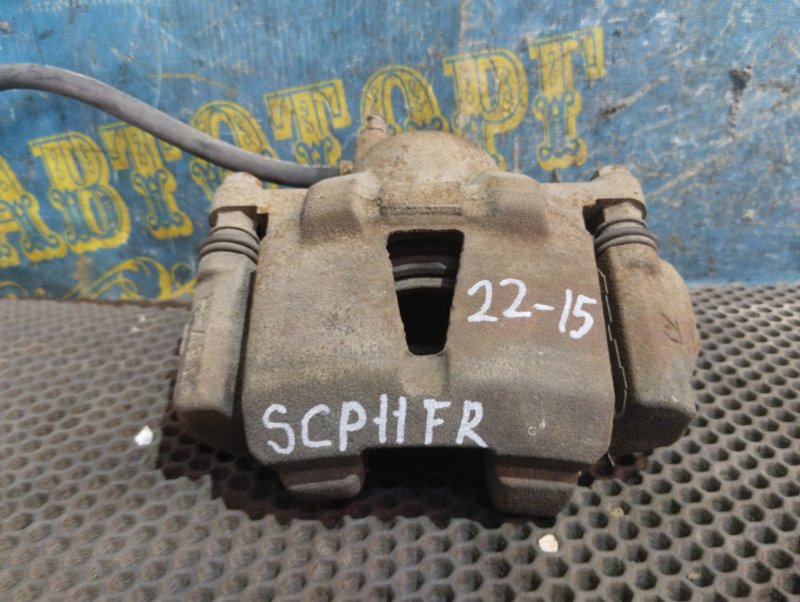 Суппорт Toyota Platz SCP11 1SZ 2000 передний правый