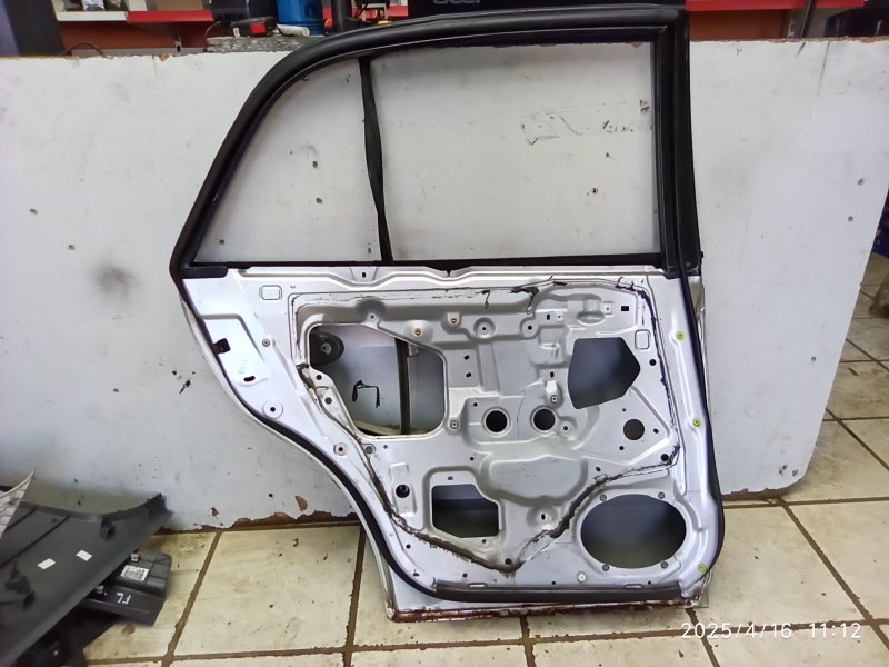 Дверь задняя левая 626 1997-2002
