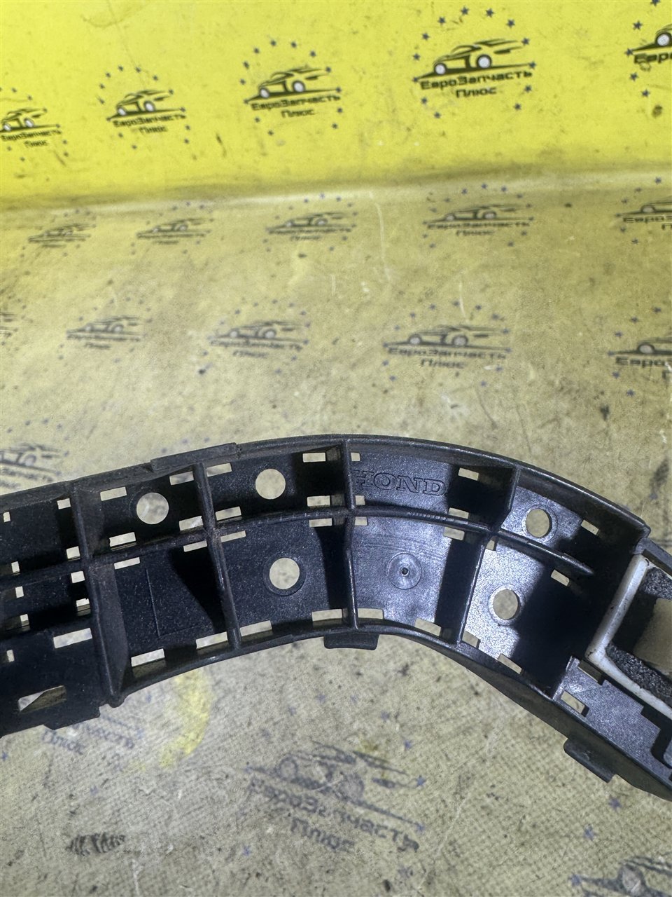 Кронштейн бампера задний левый Honda CR-V 3 RE