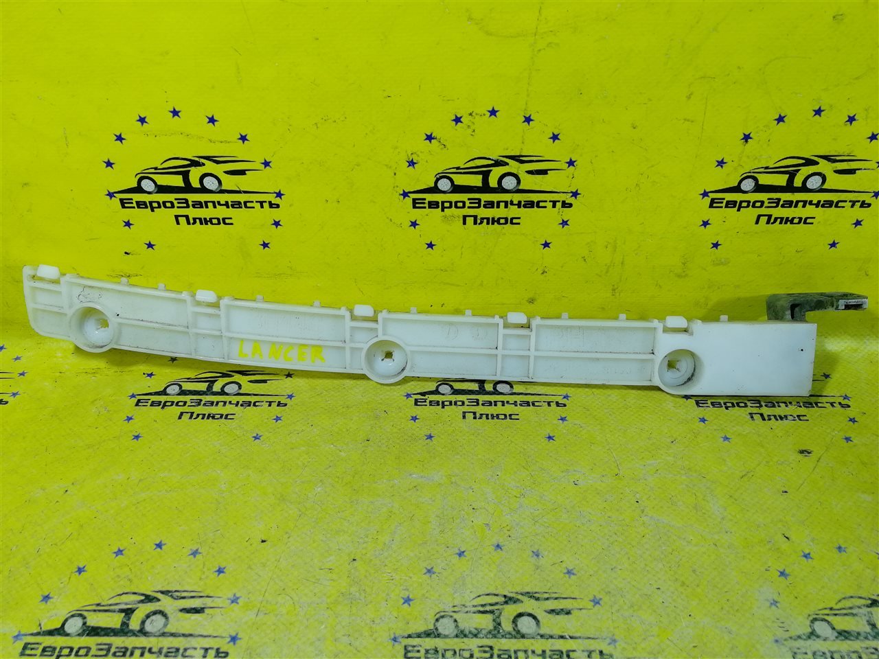 Кронштейн бампера задний правый Mitsubishi Lancer 10 6410B014 контрактная