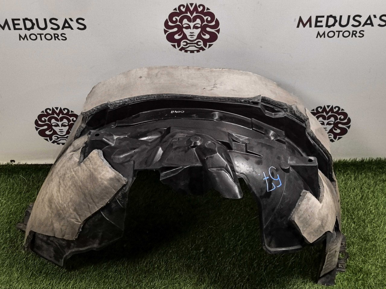 Подкрылок пластиковый Nissan 63841 задний левый