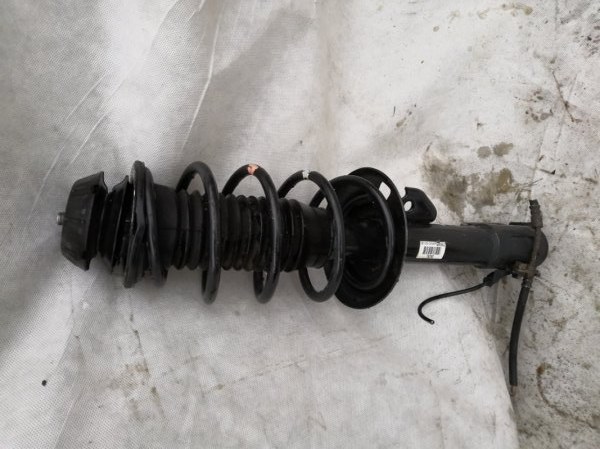 Стойка подвески Toyota Vitz SCP90 2005 передняя левая (б/у)