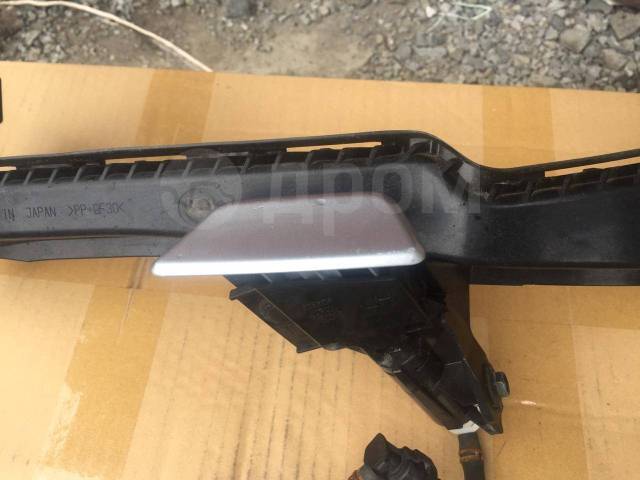 Форсунка омывателя фары левая Legacy BMD