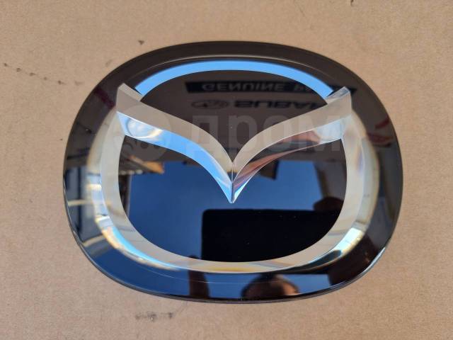 Эмблема Axela BM2AP