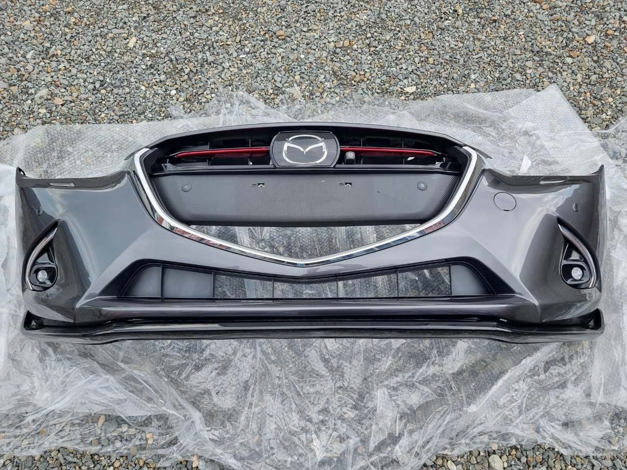 Бампер передний Mazda Demio 2014-2019 (DJ) D09H50031 контрактная