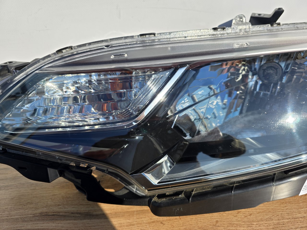 Фара галогеновая передняя левая Honda Fit ( GK