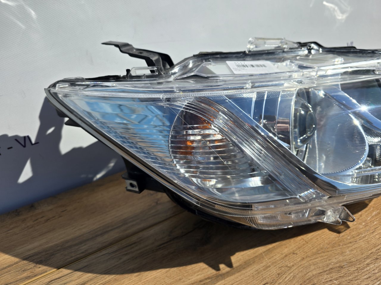Фара ксеноновая передняя правая Toyota Camry XV55