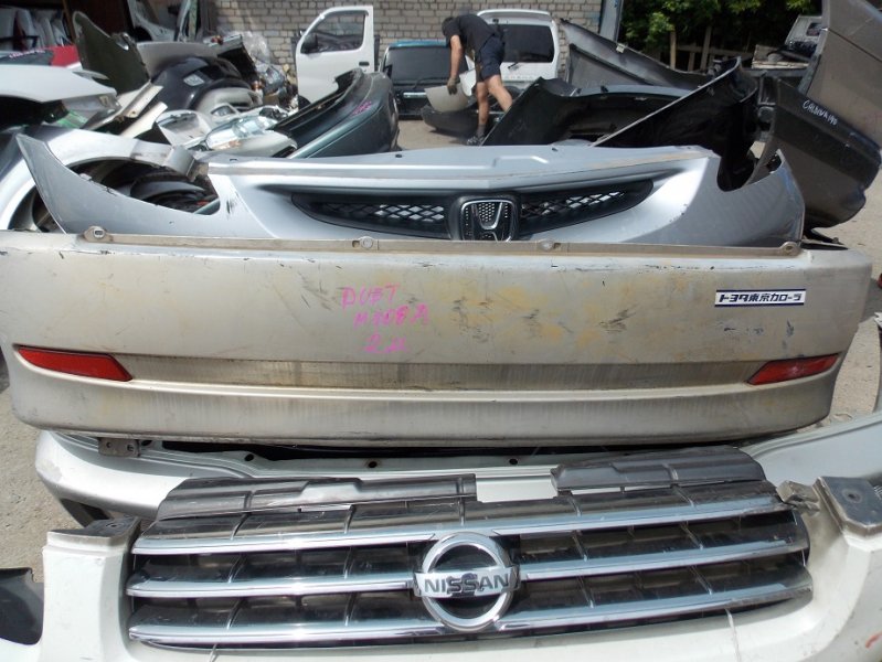 Бампер Toyota Duet M100A 2003 задний (б/у)