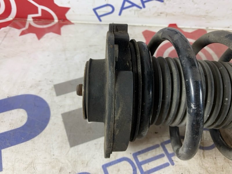 Амортизатор передний VW Passat B7 1.4