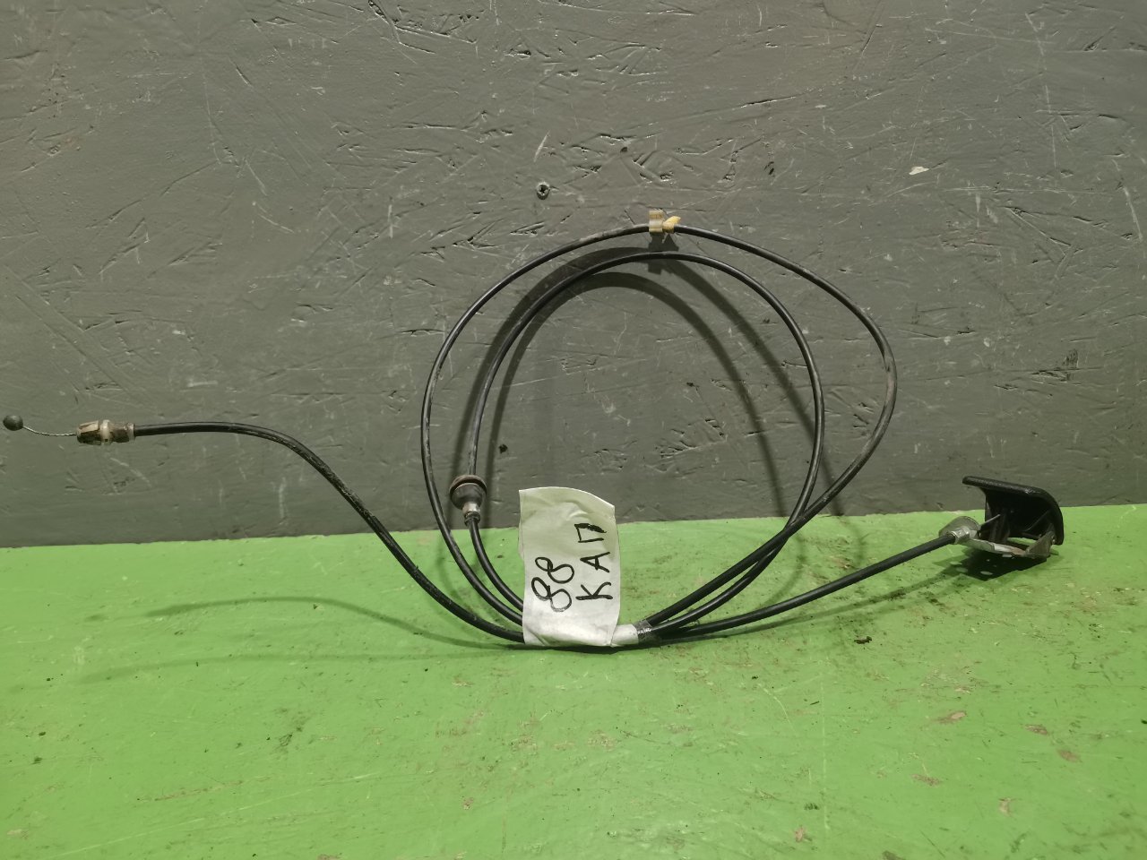 Трос замка капота Mitsubishi lancer 2008 1.8 4B10 Б/У