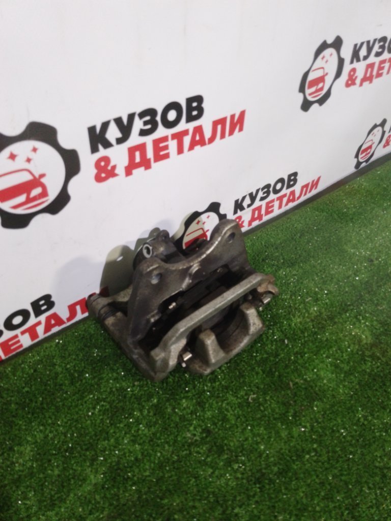Суппорт тормозной задний RX 2015-2019 AL10
