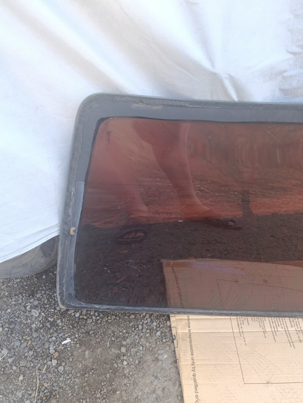 Стекло заднее Almera N16