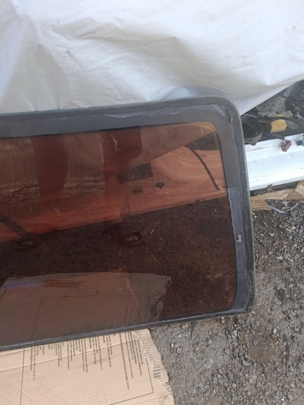 Стекло заднее Almera N16