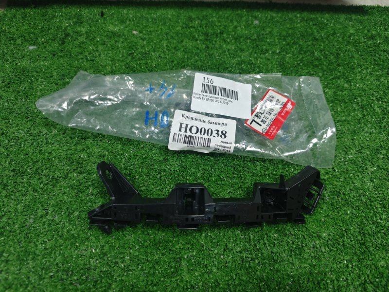 Запчасть крепление бампера переднее левое Honda Fit 2014-2019 71198-t5a-000 новая Крепление бампера переднее левое Honda Fit 2014-2019 71198-t5a-000 новая