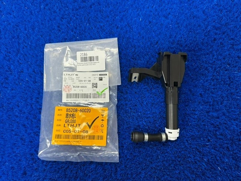 Форсунка омывателя фар передняя левая toyota Land Cruiser 2007-2012 85208-60020 новая