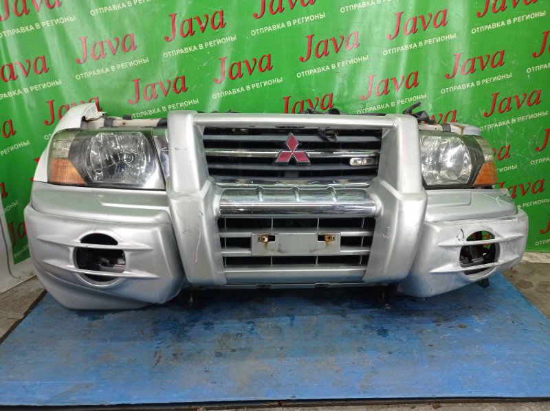 Ноускат Mitsubishi Pajero V75W 6G74 1999 передний (б/у) ГАЛОГЕН. БЕЗ ТУМАНОК. ЛОМ КРЕПЛЕНИЯ L ФАРЫ. ПОДОРВАН БАМПЕР. ПОЛЕЗ ХРОМ НА РЕШЕТКЕ.