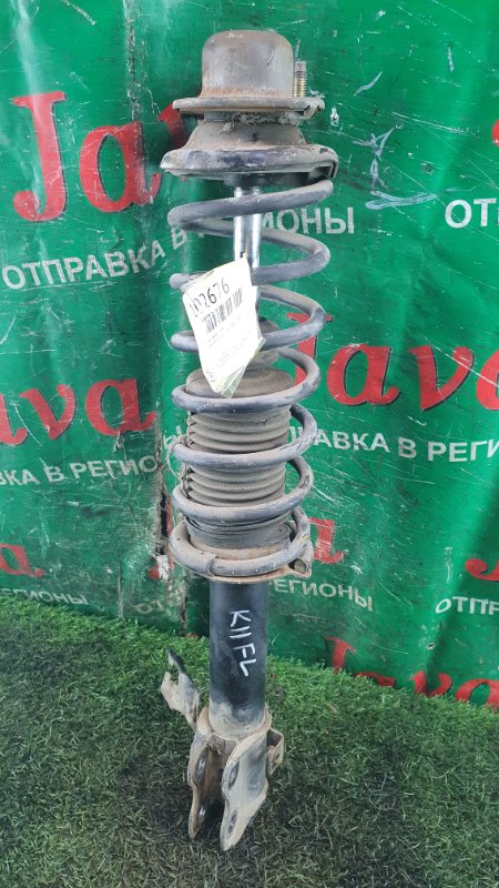 Стойка Nissan March K11 CG13DE 2000 передняя левая (б/у) 2WD. ДЕФЕКТ ПЫЛЬНИКА