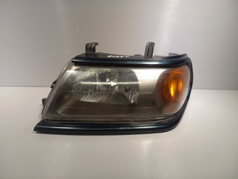 Фара Mitsubishi Pajero Sport 1 4D56 2008 левая (б/у)