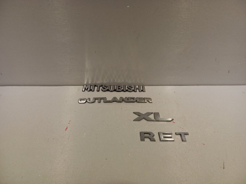 Эмблема Mitsubishi Outlander Xl 6B31 (б/у)