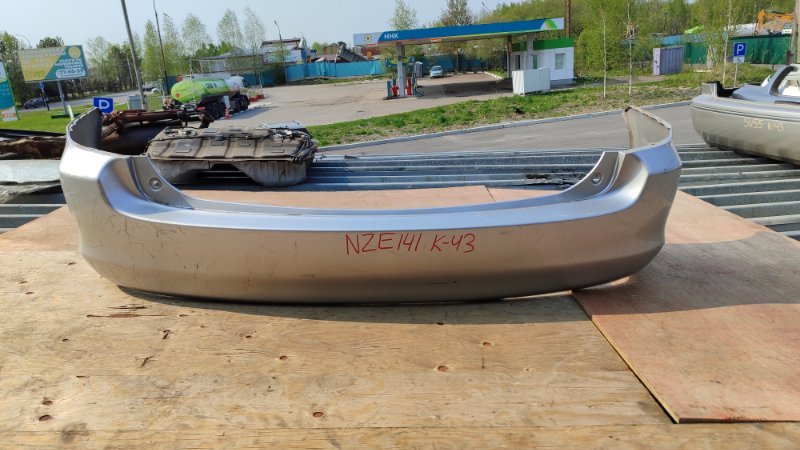 Бампер Toyota Corolla Fielder NZE141 1NZFE задний (б/у)