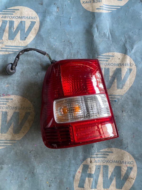 Стоп Mitsubishi Pajero Io H76W 4G93 левый (б/у)