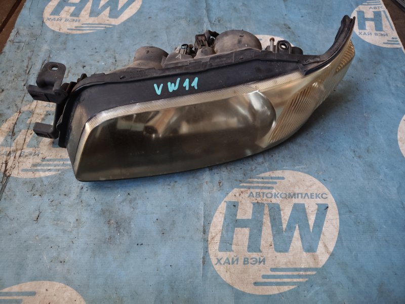 Фара Nissan Expert VW11 QG18 левая (б/у)