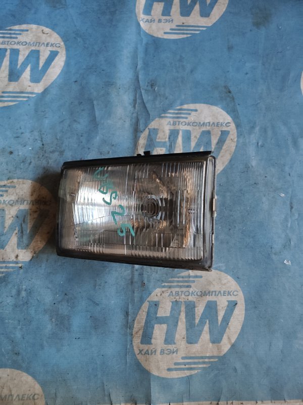 Фара Isuzu Bighorn UBS25 6VD1 левая (б/у)