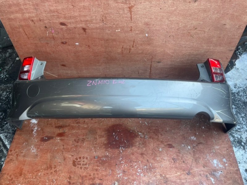 Бампер Toyota Isis ZNM10 1ZZ задний (б/у)