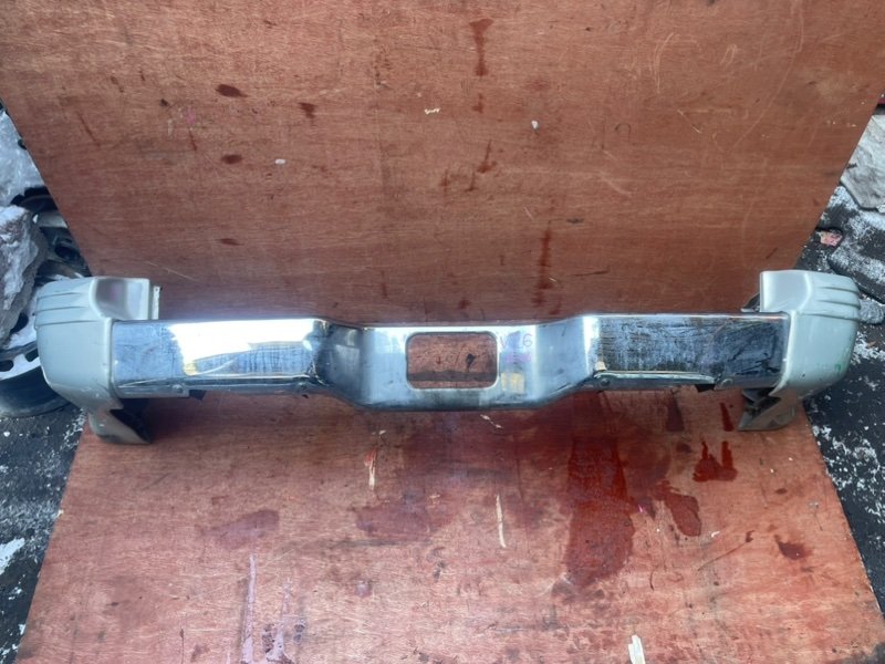 Бампер Mitsubishi Pajero V26 4M40 задний (б/у)