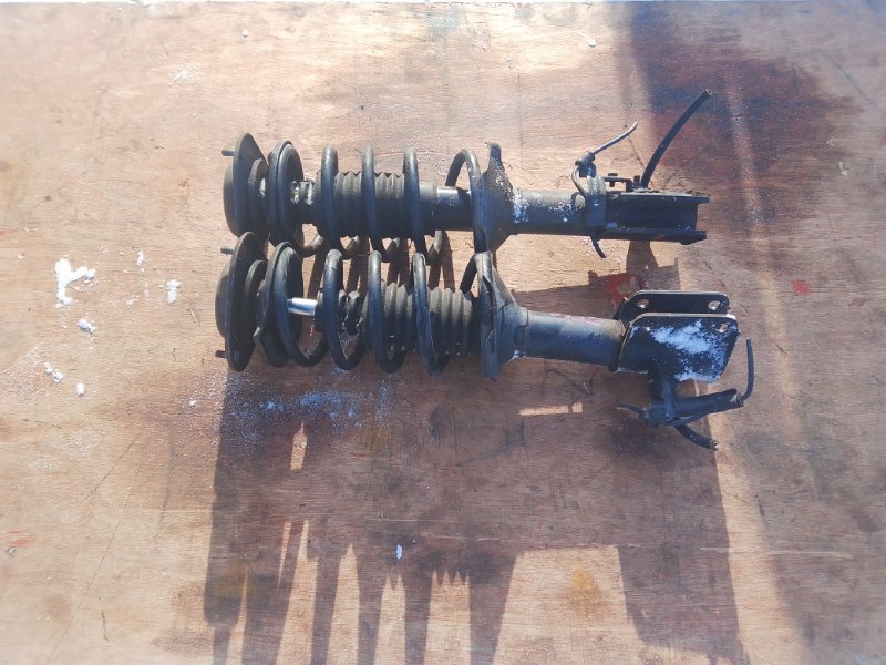 Стойка Toyota Cami J102E K3VE передняя (б/у)