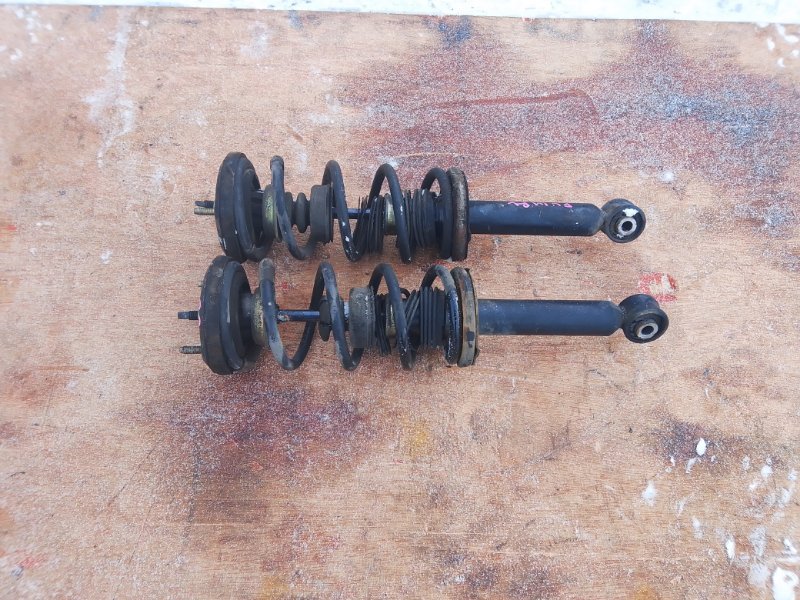 Стойка Nissan Bluebird EU14 SR18 задняя (б/у)