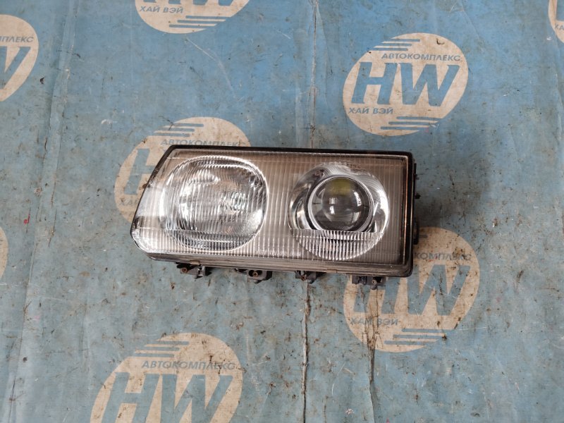 Фара Mitsubishi Delica P25W/P35W 4D56T левая (б/у)
